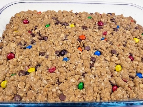 cake pan with baked monster cookie bars